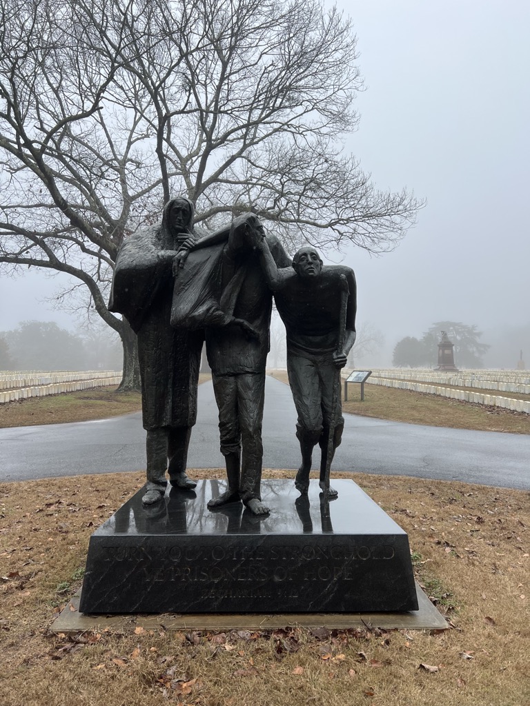 Statue at cemetary entrance