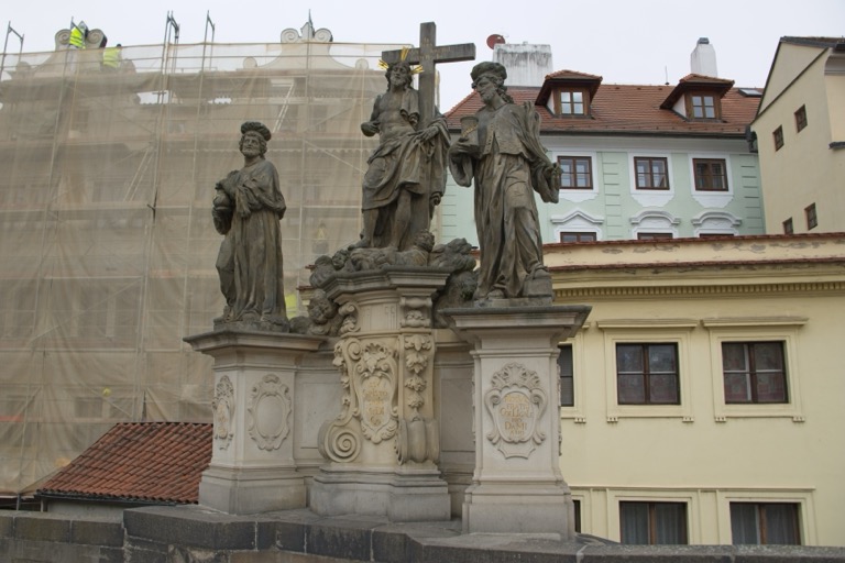 Statues of Saints Cosmas and Damian with the Holy Saviour