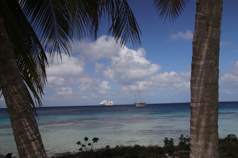 Our ship and a sailboat