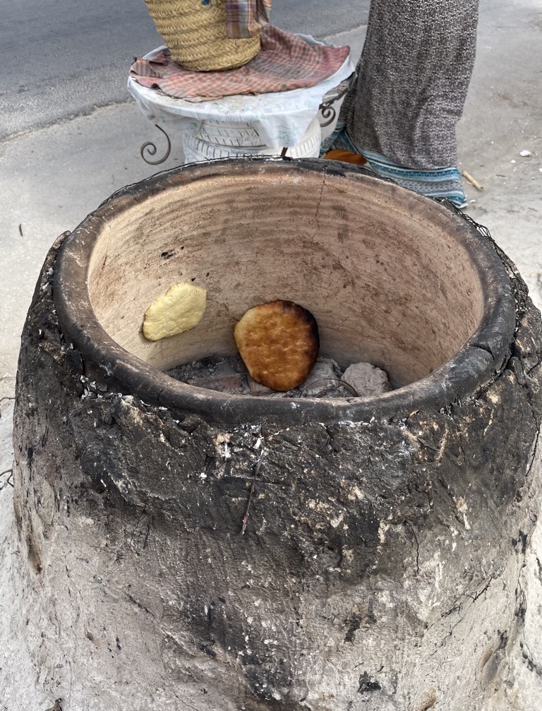 Bread baking in the tandor